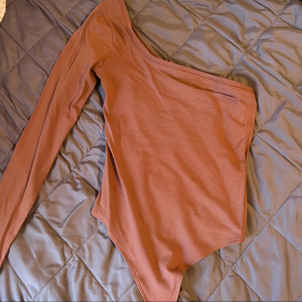 Never worn one-shoulder bodysuit